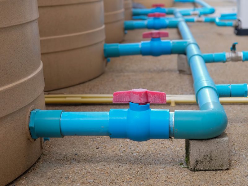 blue-water-pipe-installation-from-pump-to-tank-PTWBDHL